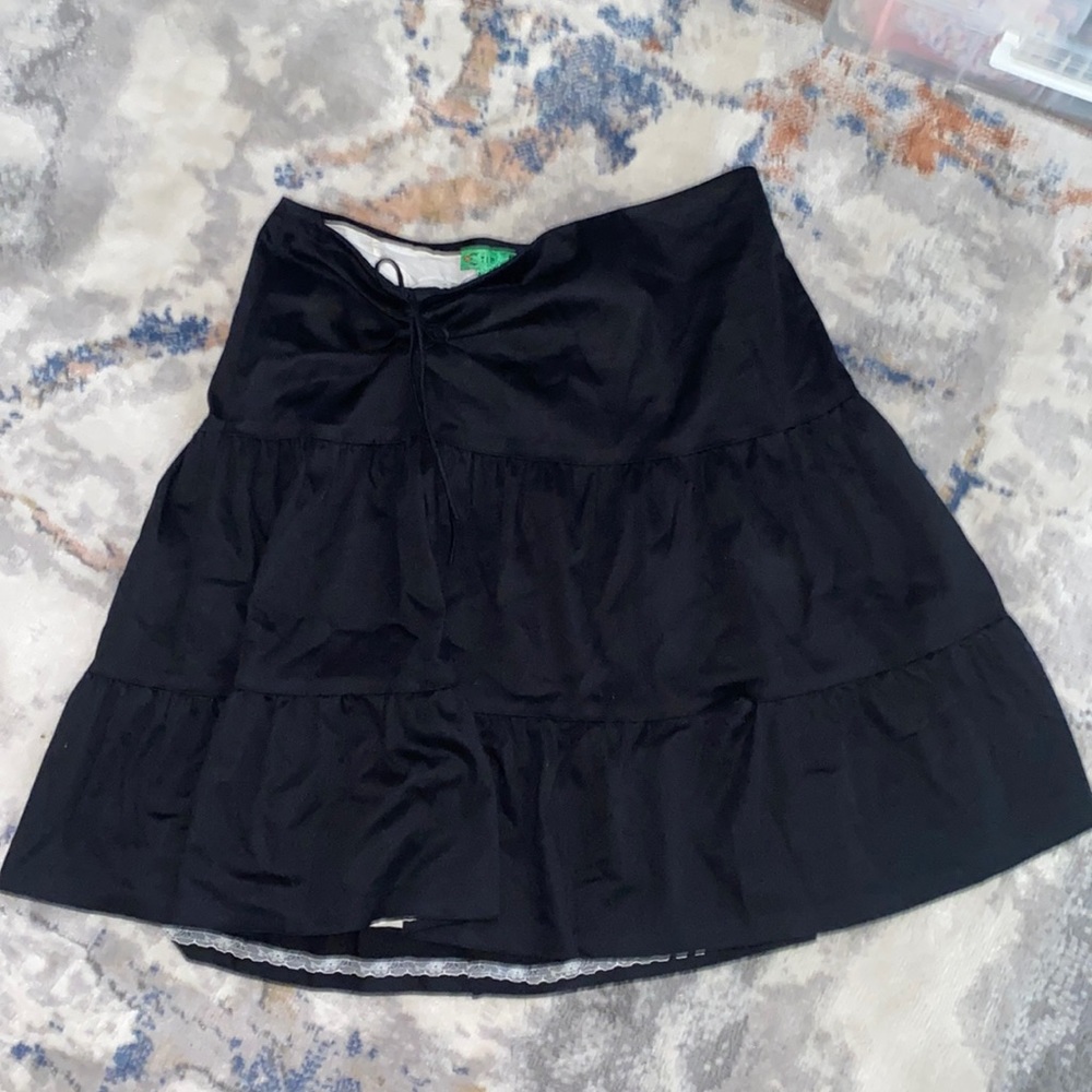 Black knee length TIBI skirt , size US10.